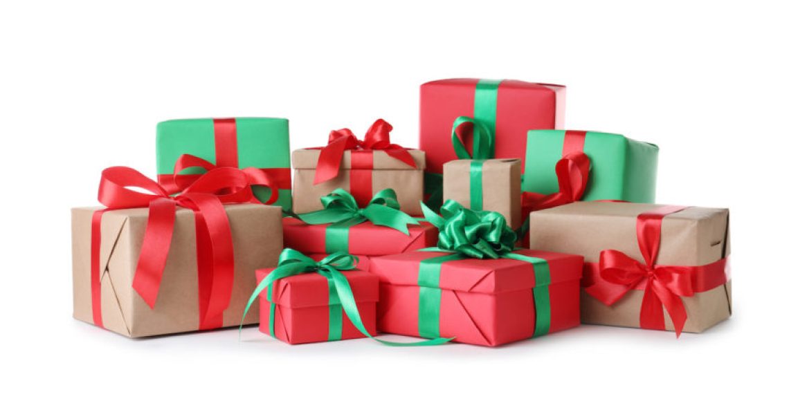 Different Christmas gift boxes on white background